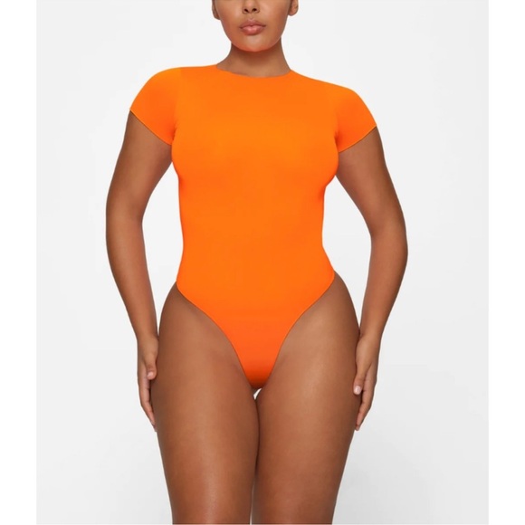 SKIMS NWOT Essential T-Shirt Bodysuit - Orange Highlighter - Picture 1 of 4